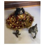 Three brass metal baby Krishna figures the large