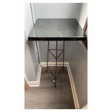Black marble top side table, triangular three leg