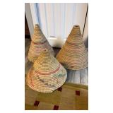 Three large cone shaped woven basket cones , To