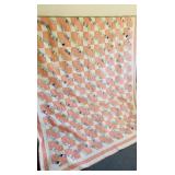 Antique patchwork quilt blanket featuring a