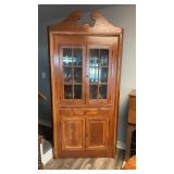 Antique stained pine corner cupboard, six pane