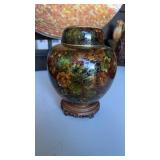 Vintage Chinese cloisonnï¿½ ginger jar on a carved
