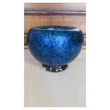 Vintage iridescent blue art glass bowl featuring