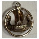 14K gold (tested) charm ï¿½ Viking ship in circle