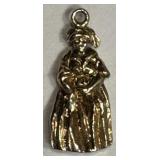 14K gold (tested) charm ï¿½ lady in vintage clothing