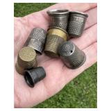 Seven (7) Thimbles