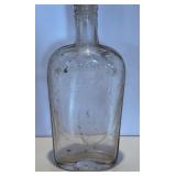 Antique Mold blown Clear Glass 'Warrented Flask'