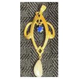 14K gold pendant w/ a natural pearl & purple stone