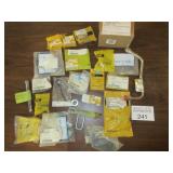 Assorted CAT small parts - bulbs, tilt level kit