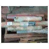 Assorted pins, trackhoe bucket pins, etc.