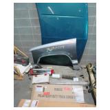 Pallet of mixed auto parts - suspension, hood, etc