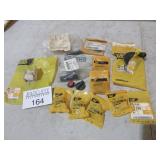 Assorted CAT plugs, knobs and a lever