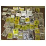 Assorted CAT + John Deere bolts, nuts, springs