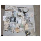 Assorted small parts ï¿½ gaskets, plates, bolts,etc