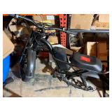 Dirtbike style electric bike missing rear wheel
