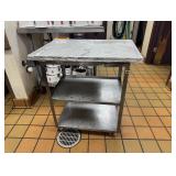Small rolling steel cart approximately 1 1/2' x 2'