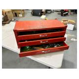 Red table top toolbox with slide out drawers