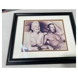 Framed Joe DiMaggio and Marilyn Monroe photo