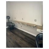 Granite slab mounted to wall