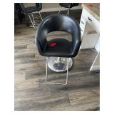 Salon chair, black metal base rounded back