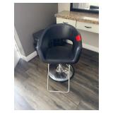 Salon chair, black metal base rounded back
