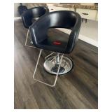 Salon chair, black metal base rounded back