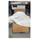 Box of hotel linens mostly bath mats