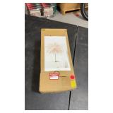 Decorative table lamp featuring a pink ostrich
