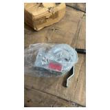 Manual hand winch rated at 2000 lbs capacity.