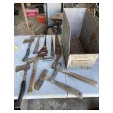Small hatchets & handsaws in metal bin Small hatchets & handsaws in metal bin