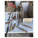 Small hatchets & handsaws in metal bin