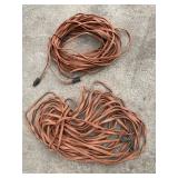 2 sets of extension cords - both orange 2 sets of extension cords - both orange
