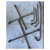 2 - 4-Way lug wrenches, misc tire tools & crow bar 2 - 4-Way lug wrenches, misc tire tools & crow bar