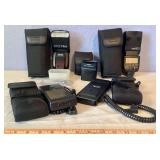 Canon Speedlite 580EX II Flashes, Canon Speedlite Transmitter ST-E2, Canon Compact Battery Packs CP-E4