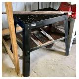Steel Tool Bench with Metal Pieces