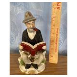 Man on Bench with Pipe Figure