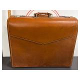 Vintage Wheary Leather Suitcase