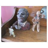 Cast Iron Bank, Statues