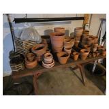 Table of Clay Pots & Saucers