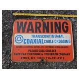 Transcontinental Coax Warning Sign