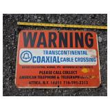 Transcontinental Coax Warning Sign