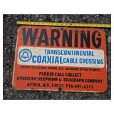 Transcontinental Coax Warning Sign