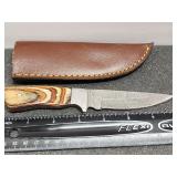 Damascus knife with leather sheath