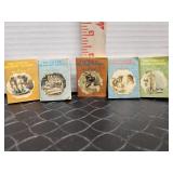 Vintage Beatrix Potter miniature dollhouse books.