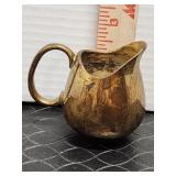Vintage brass pitcher. 2.5in high