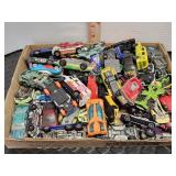 Flat full of Hot Wheel and other toy cars