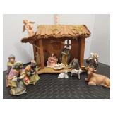 Vintage ceramic nativity scene with wood stable.