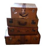 Group of Antique Travel Suitcases