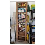Tall Wood Shelf Filled With Paint, Chemicals,
