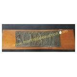 Bronze Plaque Mounted on Wood